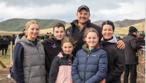 Nadine with her husband Paul, with their children Ashlee, Matt, Samantha and Victoria on farm at Taimate at their recent bull sale. Photo credit : Sharron Bennett